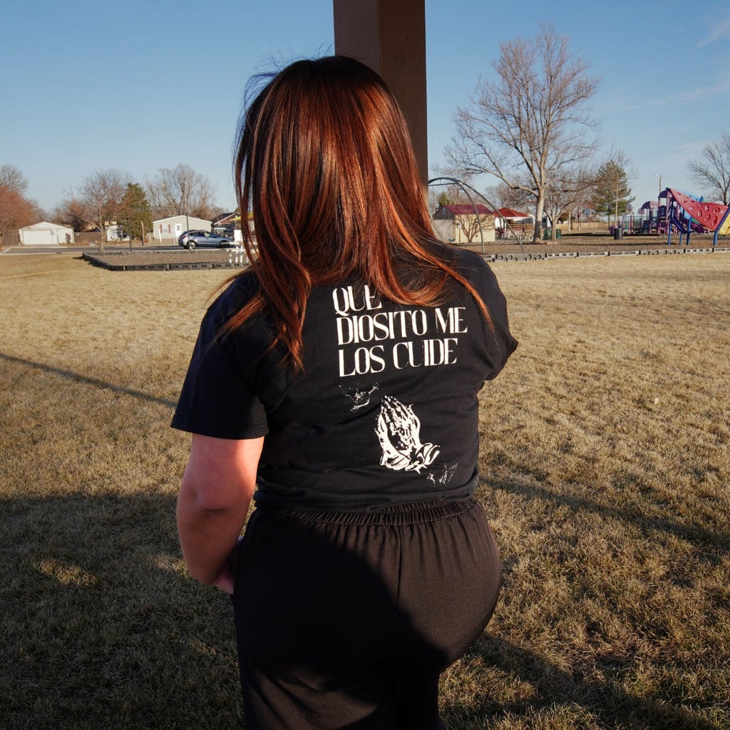 “Que Diosito Me Los Cuide” Black Tee